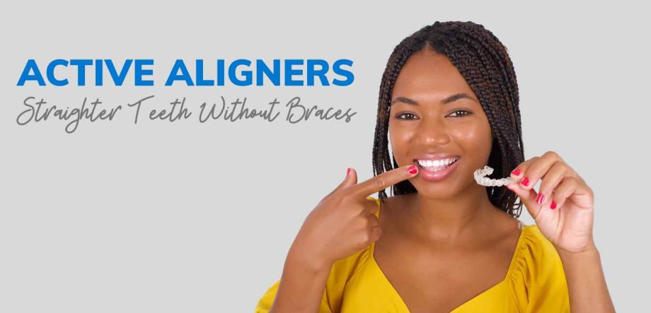 Lady holding clear aligners (Active Aligners)
